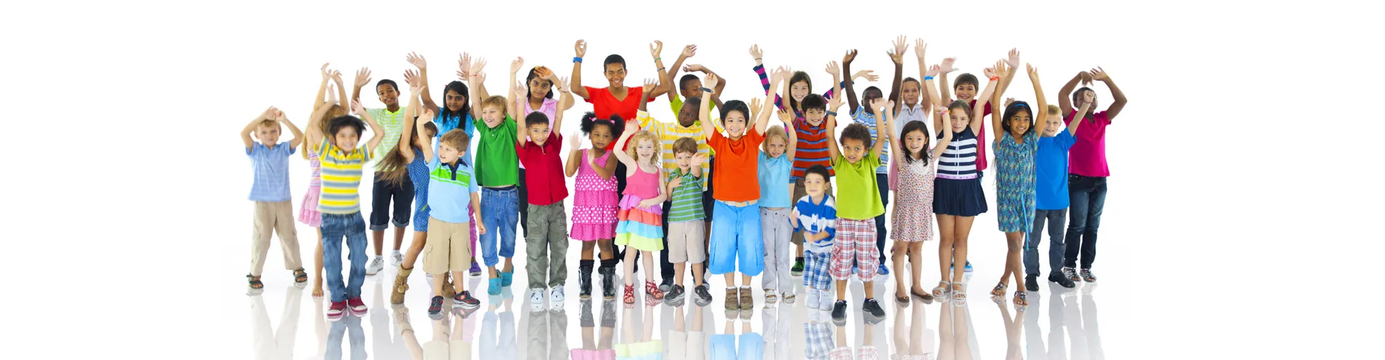 Group photo of children holding their hands up