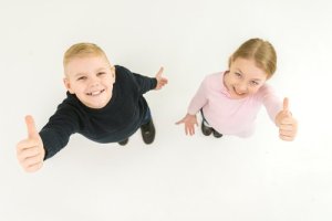 Image of two children with thumbs up